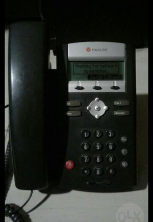 Teléfono Polycom con Cargador