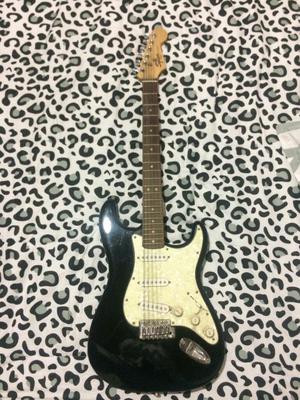 Guitarra Fender Squier con Amplificador