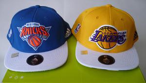 Dos Gorras Adidas Nueva Visera Plana NBA Lakers Knicks