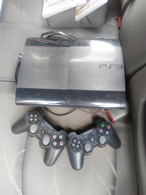 Consola de PS3 con dos controles11 juegos