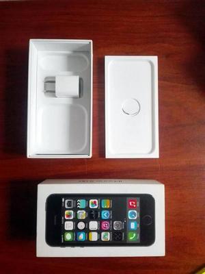 Caja, manuales y adaptador de pared de iPhone 5S