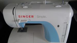 Maquina de coser Singer 