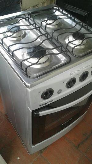 Estufa 4 Puestos a Gas Natural con Horno