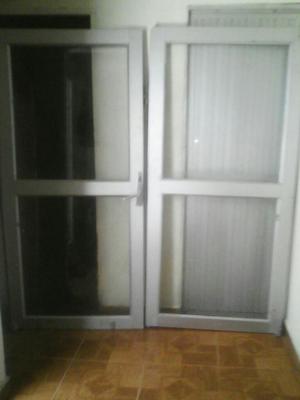 Vendo, Puerta en Vidrio Doble Metálica