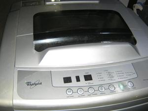 vendo lavadora marca whirlpool, gris