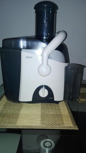 Extractor de Jugos Oster Excelente Estad