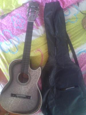 Guitarra Acústica con afinador..