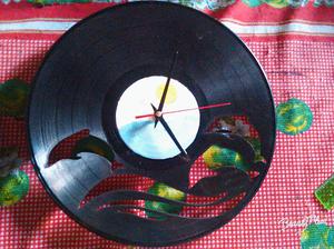 Relojes en discos de acetato cortados