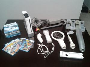 Nintendo Wii, con accesorios y peliculas
