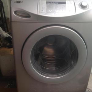 lavadora gris de 30 libras marca MAYTAG fabricada por