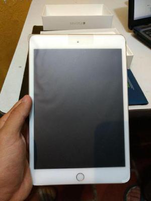 iPad mini 4 Dorada 128GB totalmente nueva con forro