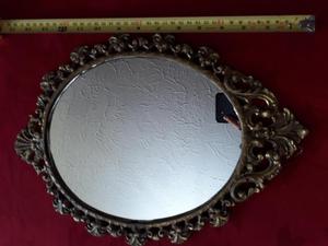 Marco espejo en bronce