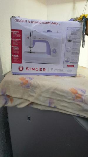 Vendo Maquina de Coser Familiar Singer