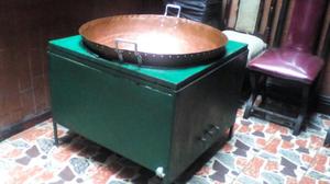 estufa industrial con paila en cobre