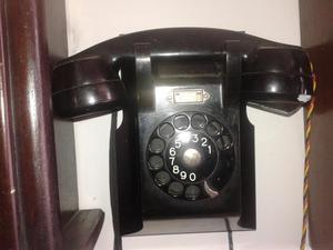 Antiguo teléfono de pared Erisson funcionando