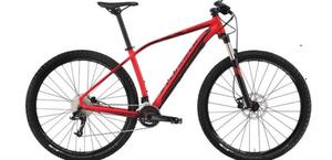 Bicicleta todo terreno marca Specialized color rojo mate