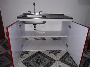 tanque, ventilador gabetero con lavaplatos.