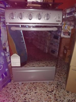 EN VENTA ESTUFA MABE CON GRATINADOR....