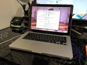 MacBook Pro 13” Intel core i5 4 GB RAM, 1 TERA DD