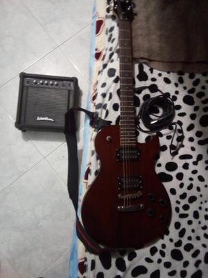 Guitarra Washburn con amplificador