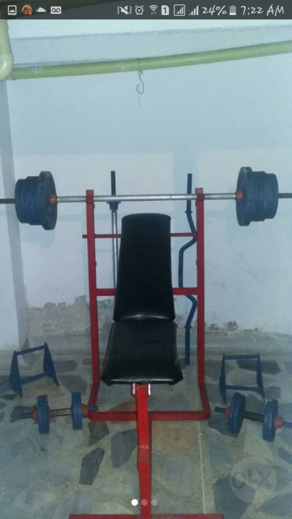 Set gym con 80 kg en discos de hierro y barras