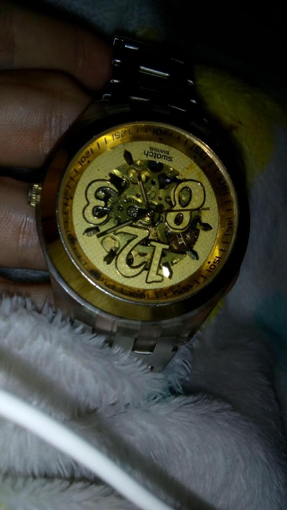 Reloj Dorado