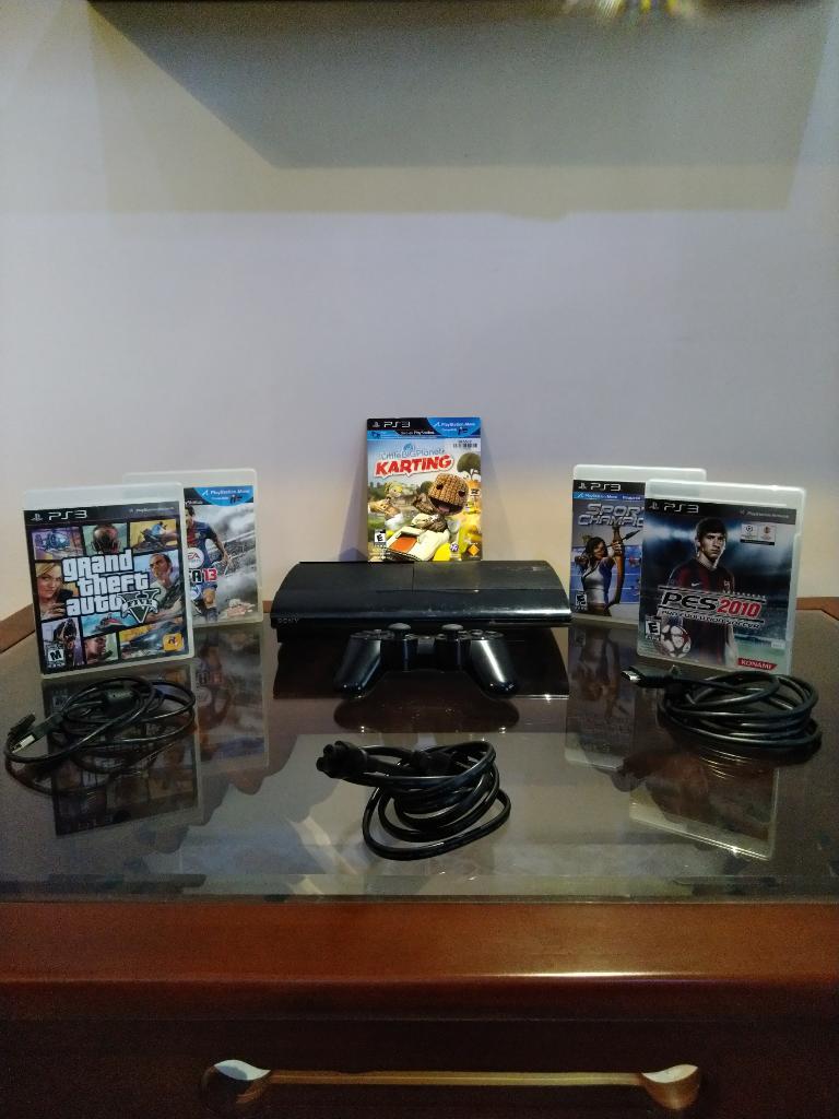 Ps3 Slim con 5 Juegos