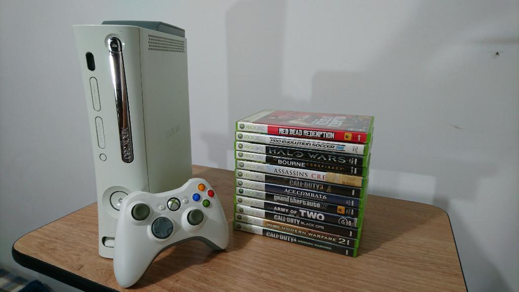 Vendo Xbox 360 Pro control 12 Juegos