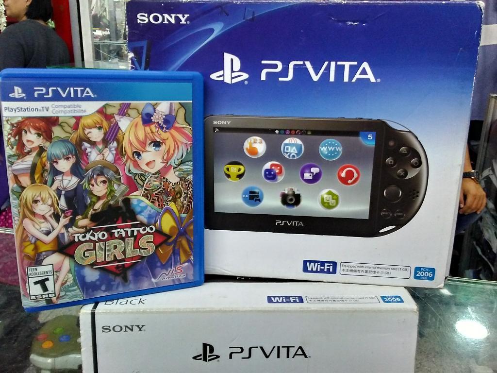 Playstation Vita con Su Caja Y Juegos