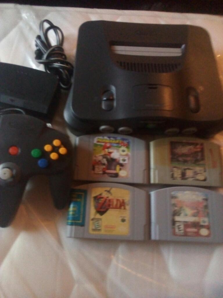 Nintendo 64 con 4 Casetes Y Una Palanca