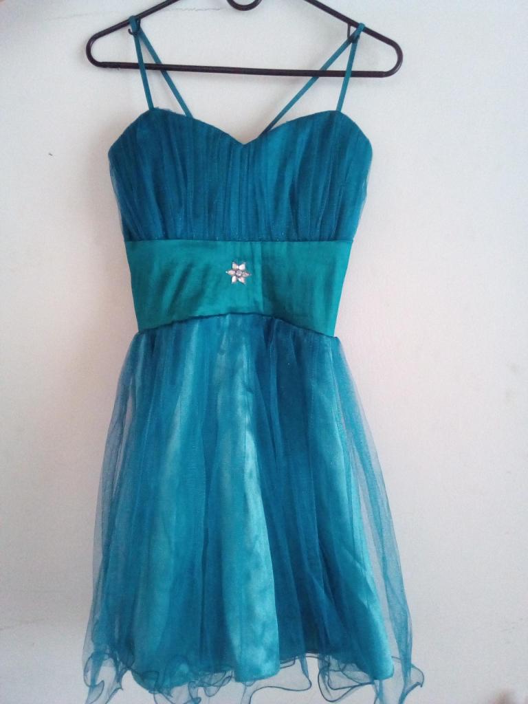 Se vende vestido para quince tipo corsé color azul turquesa