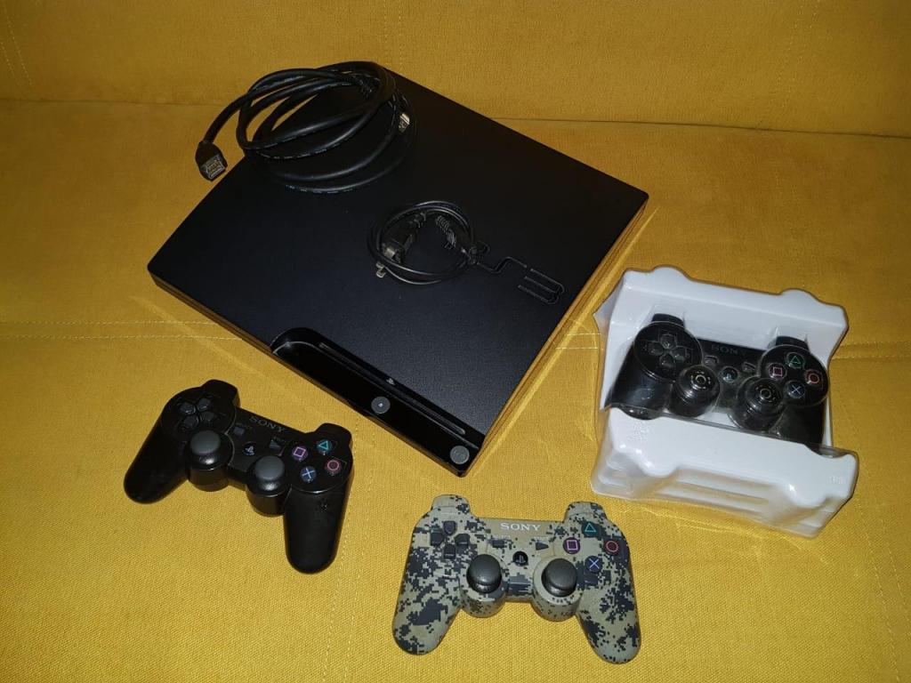 PS3 con 8juegos y 2 controles