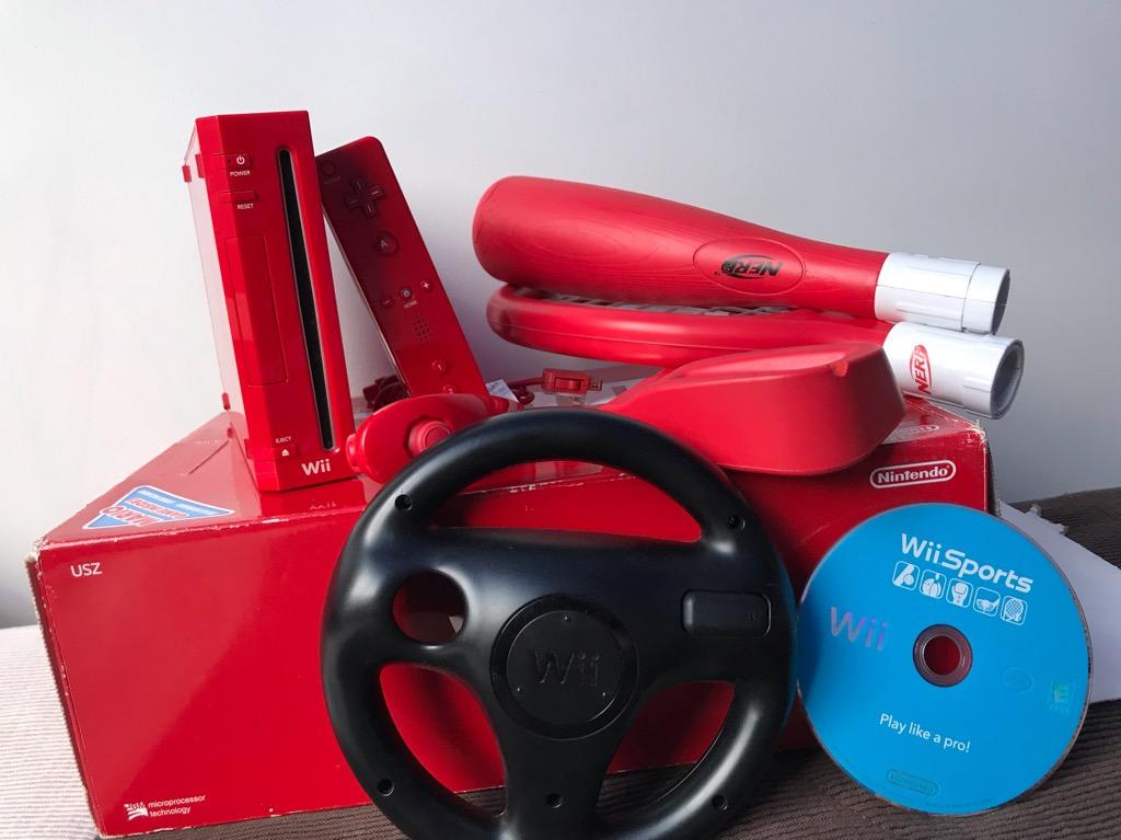 Wii Rojo con Accesorios Nerf Y Manubrio