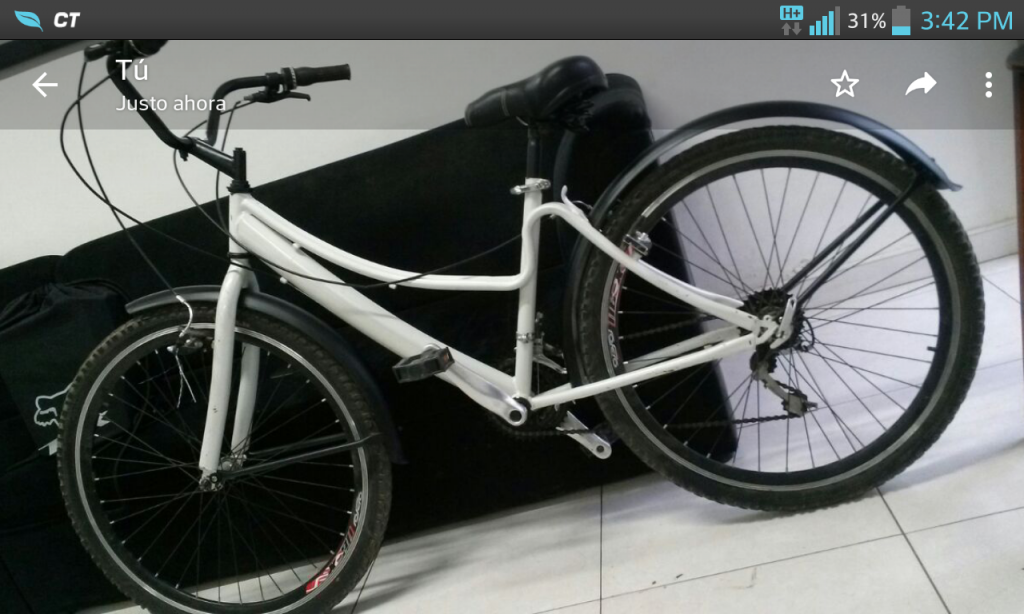 vendo bicicleta playera color negra y blanca