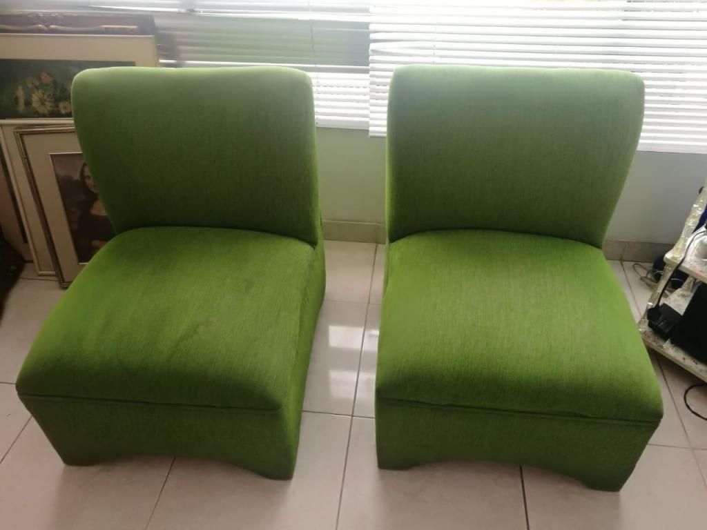 Sala con dos poltronas y sofa