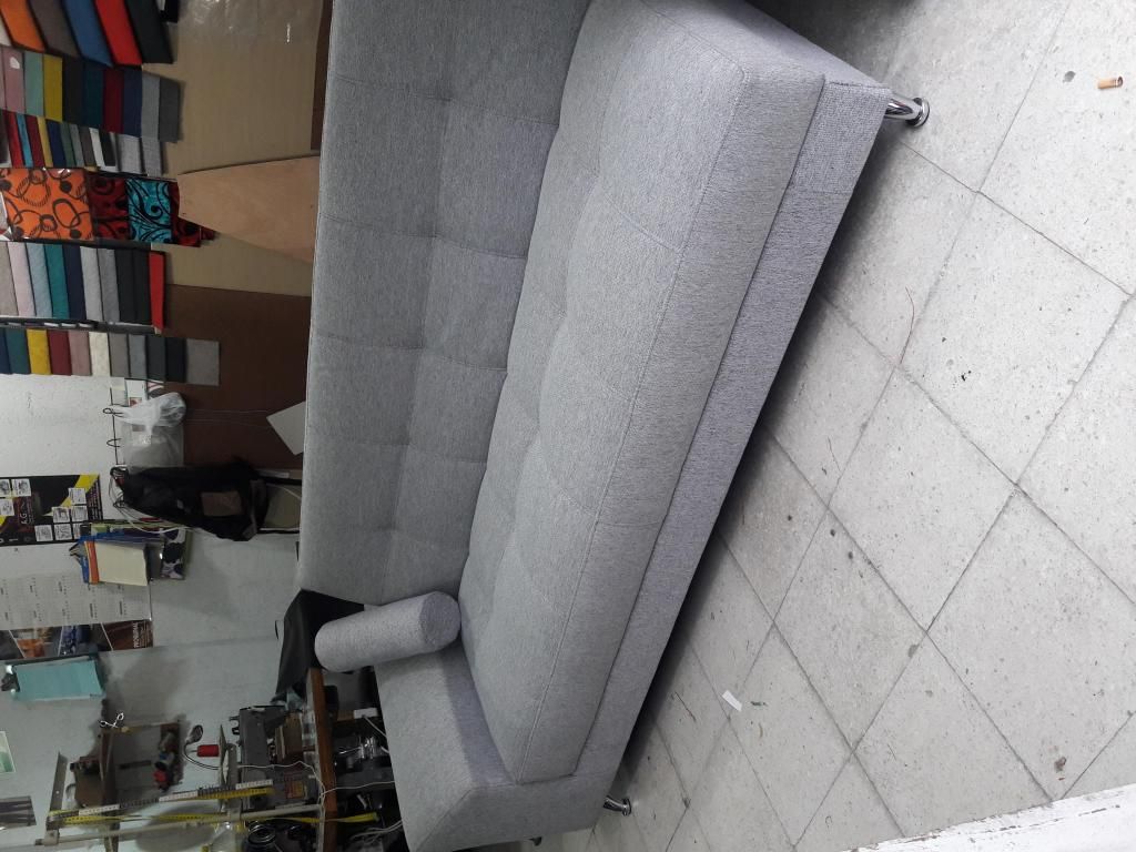 espectacular sofá cama gris
