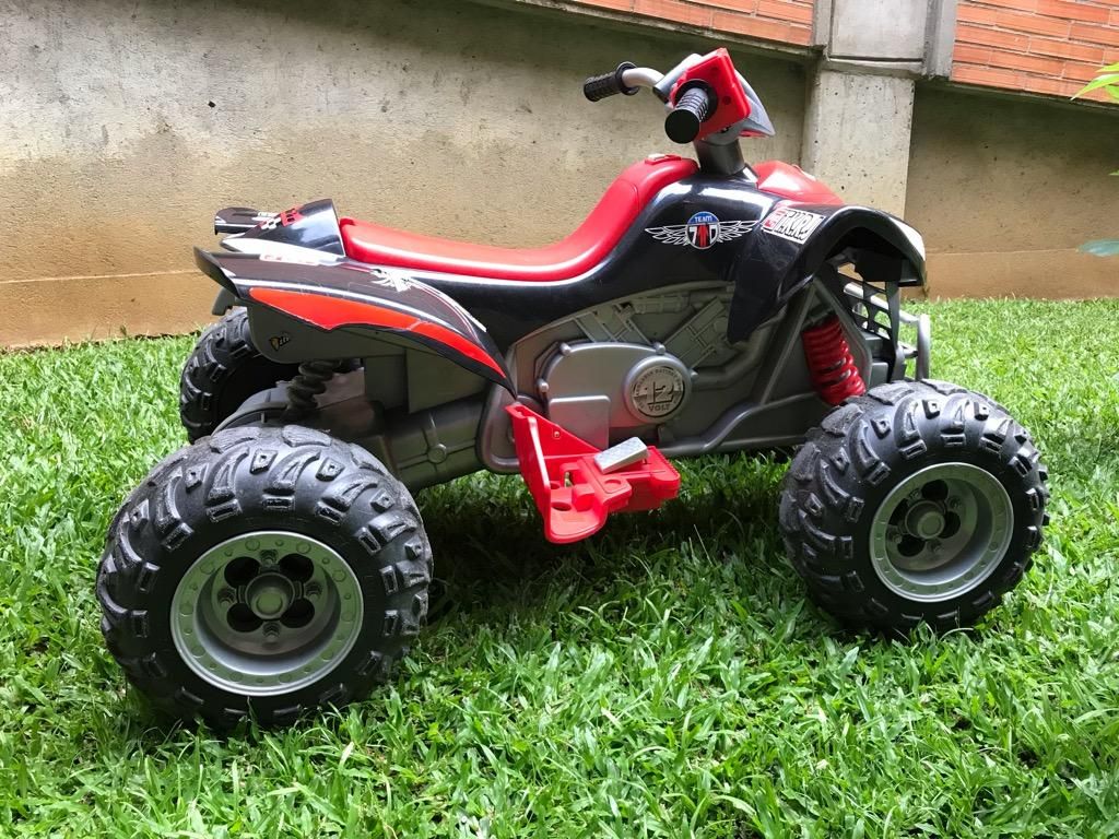 cuatrimoto power wheels Juguete niños