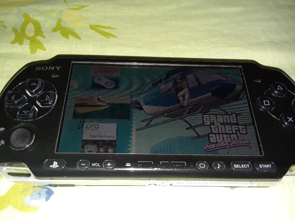 Psp con Cargador Y Juegos