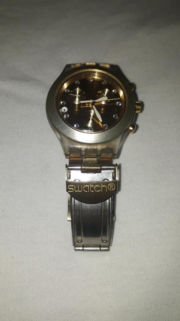 Reloj Swatch Svckag Dorado