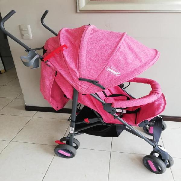 coche bebe rosado reclinable