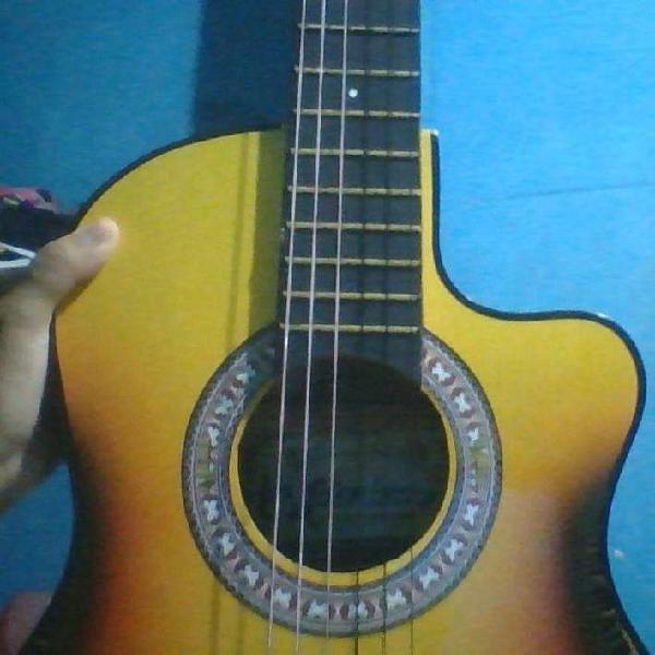 Guitarra acústica milenium, color amarillo con borde negro