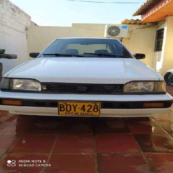 Impecable Mazda 323