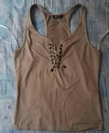 Camisa esqueleto de ELA